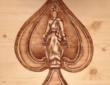 Ace. Wood burning and Acrylic on Wood Panel. 2 ft x 3 ft. 2011